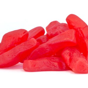 A bunch of red Swedish Fish gummies.