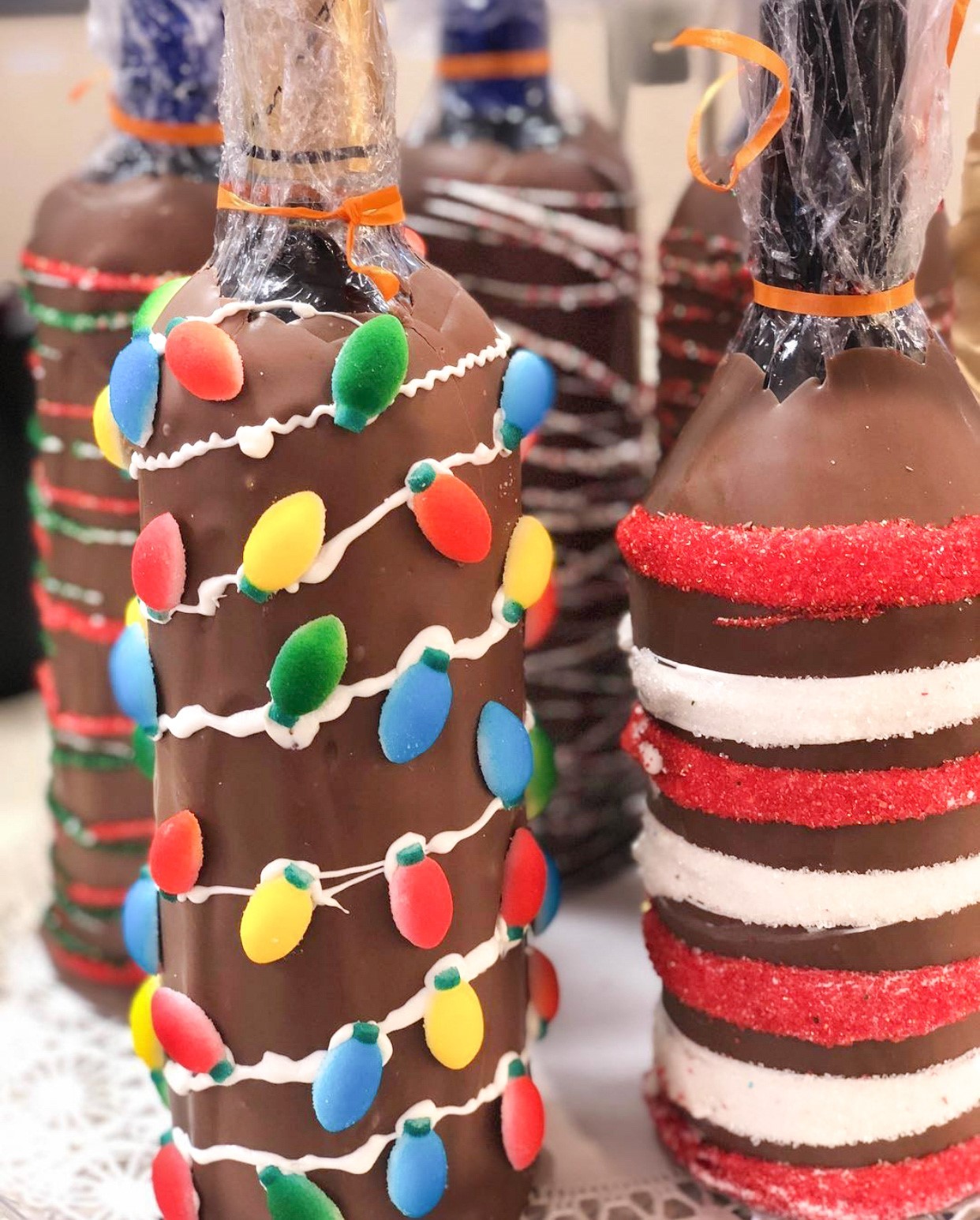 Christmas themed chocolate dipped wine bottles from Jenkinson's Sweet Shop.
